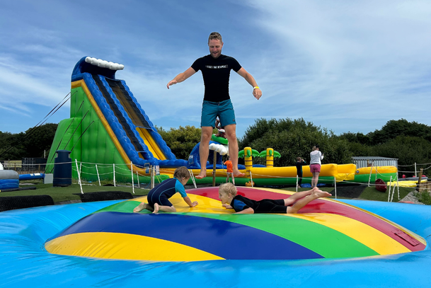 Family enjoying activities at Cornwall Slip and Slide